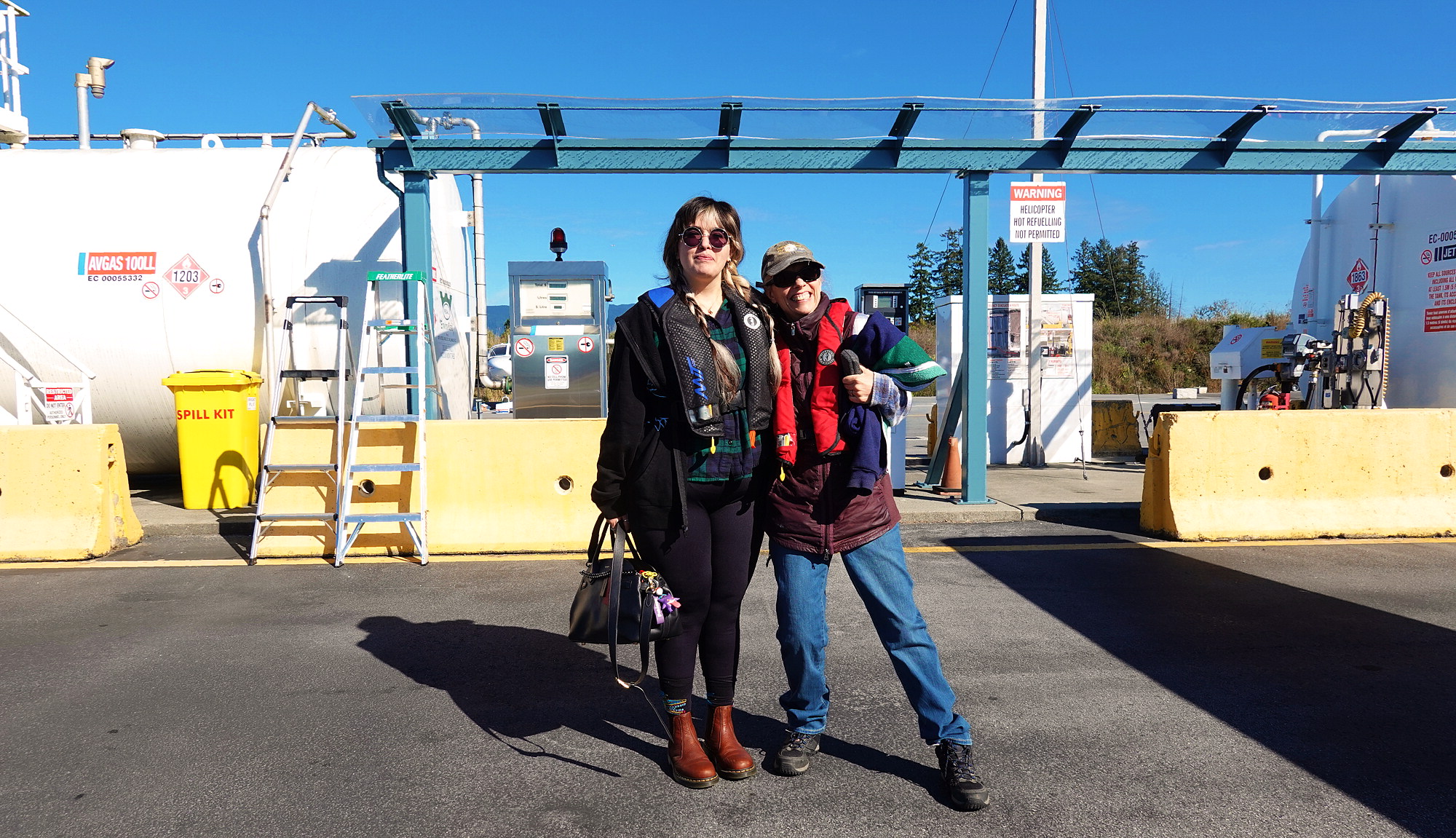 Janine and Mariana after fueling the plane
